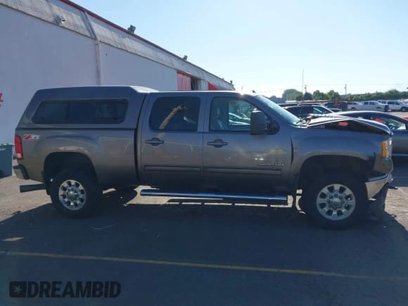 ✅ 2012 GMC Sierra 2500HD SLT • VIN: 1GT121C81CF149119 • Lot: 42745434. Wystawiony na IAAI z przebiegiem 172 132 mil. Bezpłatny archiwum sprzedaży aukcyjnych z USA i szczegółowy raport historii pojazdu na DreamBid. Zdjęcie 13.