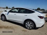 ✅ 2024 Tesla Model Y Long Range • VIN: 7SAYGDEE2RF058834 • Лот: 63117935. Опубликован ранее на Copart с пробегом 39 172 миль. Бесплатный доступ к архиву аукционных продаж из США и подробный отчёт об истории автомобиля на DreamBid. Изображение 2.