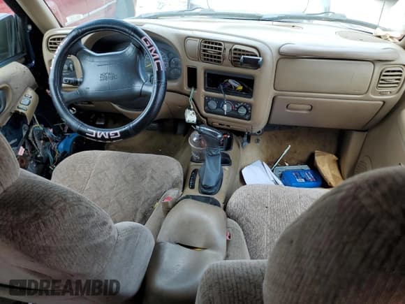 ✅ 1998 GMC Jimmy SLS • VIN: 1GKCS13W1W2573343 • Lot: 61846274. Wystawiony na Copart z przebiegiem Nie podano. Bezpłatny archiwum sprzedaży aukcyjnych z USA i szczegółowy raport historii pojazdu na DreamBid. Zdjęcie 8.