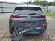 ✅ 2021 Hyundai Kona SEL • VIN: KM8K22AA7MU706642 • Лот: 64498245. Опубликован ранее на Copart с пробегом 99 999 миль. Бесплатный доступ к архиву аукционных продаж из США и подробный отчёт об истории автомобиля на DreamBid. Изображение 6.