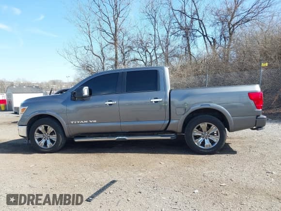 ✅ 2018 Nissan Titan SV • VIN: 1N6AA1E57JN551457 • Lot: 41790327. Listed on IAAI with 140,942 mi. Free auction sales archive from the USA and detailed vehicle history report at DreamBid. Image 15.