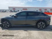 ✅ 2023 Kia EV6 Wind • VIN: KNDC34LA6P5610899 • Lot: 41730242. Listed on IAAI with 63,143 mi. Free auction sales archive from the USA and detailed vehicle history report at DreamBid. Image 14.