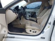 ✅ 2013 Volkswagen Passat SEL • VIN: 1VWCP7A37DC070316 • Lot: 42920334. Listed on IAAI with 211,425 mi. Free auction sales archive from the USA and detailed vehicle history report at DreamBid. Image 5.