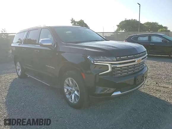 ✅ 2021 Chevrolet Suburban Premier • VIN: 1GNSCFKD9MR313379 • Lot: 81958015. Wystawiony na Copart z przebiegiem 89 882 mil. Bezpłatny archiwum sprzedaży aukcyjnych z USA i szczegółowy raport historii pojazdu na DreamBid. Zdjęcie 14.
