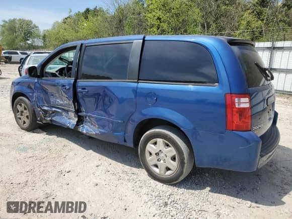 2010 Dodge Grand Caravan SE z VIN 2D4RN4DE2AR197902, wystawiony jako Copart lot #52876385 z przebiegiem 112 435 mil mil oraz Szkoda całkowita • Salvage title. Historia ofert i sprzedaży dostępna na DreamBid. Obrazek 2.