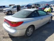 ✅ 2002 Saturn SC • VIN: 1G8ZY12722Z243236 • Лот: 42464967. Опубликован ранее на IAAI с пробегом 148 855 миль. Бесплатный доступ к архиву аукционных продаж из США и подробный отчёт об истории автомобиля на DreamBid. Изображение 4.