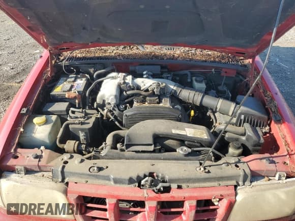 ✅ 1999 Kia Sportage • VIN: KNDJA7237X5597517 • Lot: 82673504. Listed on Copart with 114,236 mi. Free auction sales archive from the USA and detailed vehicle history report at DreamBid. Image 12.