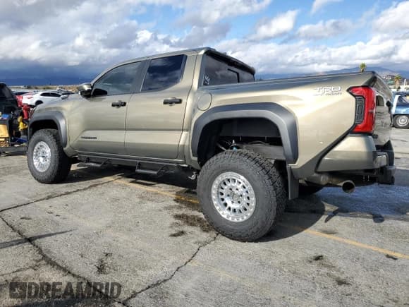 ✅ 2024 Toyota Tacoma TRD Off Road Hybrid • VIN: 3TYLC5LN9RT015510 • Lot: 82502775. Listed on Copart with 8,386 mi. Free auction sales archive from the USA and detailed vehicle history report at DreamBid. Image 2.
