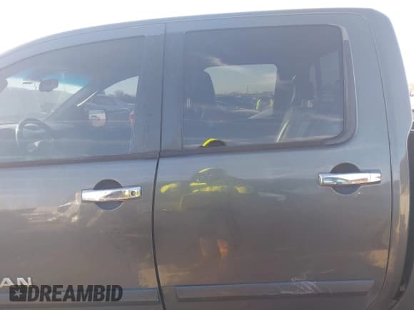 ✅ 2005 Nissan Titan LE • VIN: 1N6AA07B65N501054 • Lot: 41728466. Listed on IAAI with 318,859 mi. Free auction sales archive from the USA and detailed vehicle history report at DreamBid. Image 14.