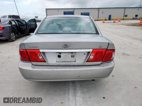 ✅ 2004 Kia Optima LX • VIN: KNAGD126X45330289 • Lot: 60424745. Wystawiony na Copart z przebiegiem 181 780 mil. Bezpłatny archiwum sprzedaży aukcyjnych z USA i szczegółowy raport historii pojazdu na DreamBid. Zdjęcie 6.