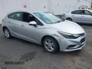 ✅ 2018 Chevrolet Cruze LT • VIN: 3G1BE6SM5JS614817 • Lot: 42883270. Listed on IAAI with 117,781 mi. Free auction sales archive from the USA and detailed vehicle history report at DreamBid. Image 1.