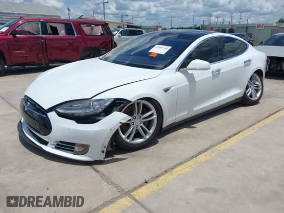 ✅ 2014 Tesla Model S 60 • VIN: 5YJSA1S17EFP44916 • Lot: 42585710. Listed on IAAI with 105,014 mi. Free auction sales archive from the USA and detailed vehicle history report at DreamBid. Image 2.