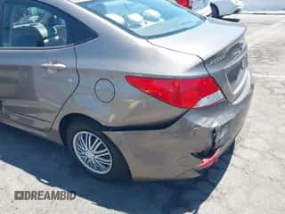 2014 Hyundai Accent GLS with VIN KMHCT4AE8EU655136, listed as a IAAI auction lot 42797016 with 102,554 mi miles and . Bid and sale history available at DreamBid. Image 6.