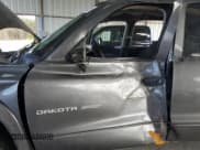 ✅ 2002 Dodge Dakota Sport • VIN: 1B7HG38N12S515919 • Lot: 42930835. Wystawiony na Copart z przebiegiem 180 701 mil. Bezpłatny archiwum sprzedaży aukcyjnych z USA i szczegółowy raport historii pojazdu na DreamBid. Zdjęcie 7.