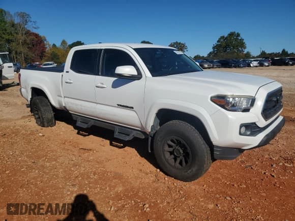 ✅ 2017 Toyota Tacoma SR5 • VIN: 5TFBZ5DN9HX001927 • Lot: 82623785. Listed on Copart with 130,642 mi. Free auction sales archive from the USA and detailed vehicle history report at DreamBid. Image 4.