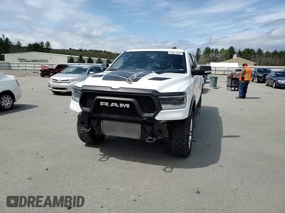 2020 Ram 1500 Rebel z VIN 1C6SRFLM1LN230872, wystawiony jako Copart lot #55671585 z przebiegiem 97 202 mil mil oraz Szkoda całkowita • Salvage title. Historia ofert i sprzedaży dostępna na DreamBid. Obrazek 14.