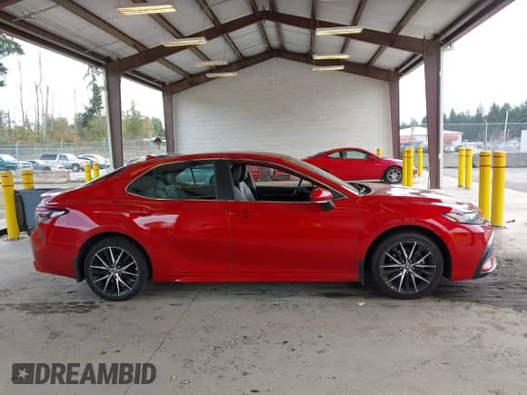 2022 Toyota Camry SE z VIN 4T1T11AK2NU014820, wystawiony jako IAAI lot #43348665 z przebiegiem 91 916 mil mil oraz . Historia ofert i sprzedaży dostępna na DreamBid. Obrazek 13.