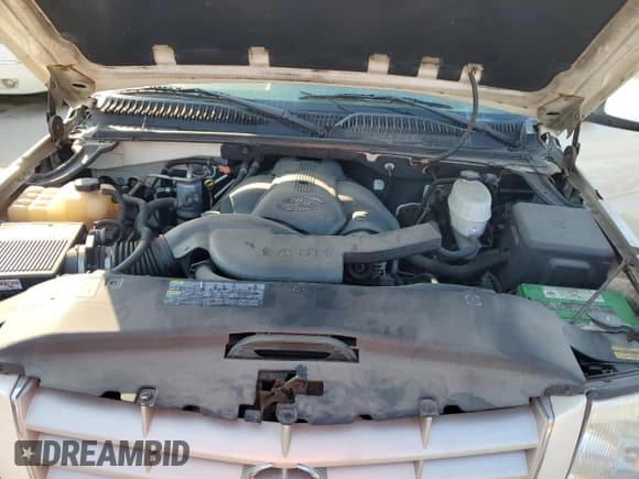 ✅ 2005 Cadillac Escalade • VIN: 1GYEK63NX5R140791 • Lot: 71642454. Wystawiony na Copart z przebiegiem 174 025 mil. Bezpłatny archiwum sprzedaży aukcyjnych z USA i szczegółowy raport historii pojazdu na DreamBid. Zdjęcie 12.