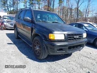 ✅ 1998 Isuzu Rodeo S • VIN: 4S2CK58W2W4315935 • Lot: 41593711. Listed on IAAI with 162,065 mi. Free auction sales archive from the USA and detailed vehicle history report at DreamBid. Image 1.