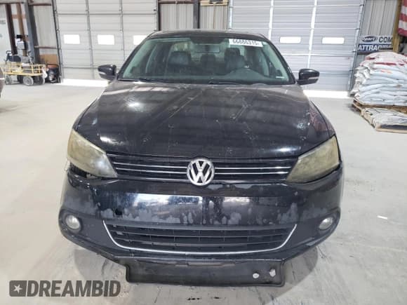 ✅ 2013 Volkswagen Jetta TDI w/Premium/Nav • VIN: 3VW3L7AJ2DM292383 • Lot: 66886315. Listed on Copart with 193,519 mi. Free auction sales archive from the USA and detailed vehicle history report at DreamBid. Image 5.