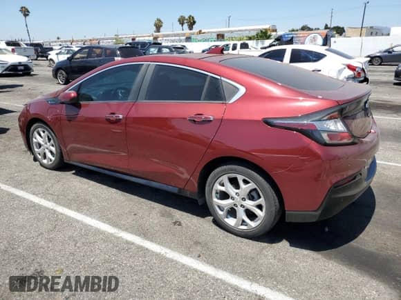 2016 Chevrolet Volt Premier z VIN 1G1RD6S50GU136423, wystawiony jako Copart lot #63351723 z przebiegiem 94 448 mil mil oraz . Historia ofert i sprzedaży dostępna na DreamBid. Obrazek 2.