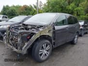 ✅ 2017 Honda Pilot EX-L • VIN: 5FNYF5H77HB033090 • Lot: 42359412. Listed on IAAI with 131,032 mi. Free auction sales archive from the USA and detailed vehicle history report at DreamBid. Image 18.