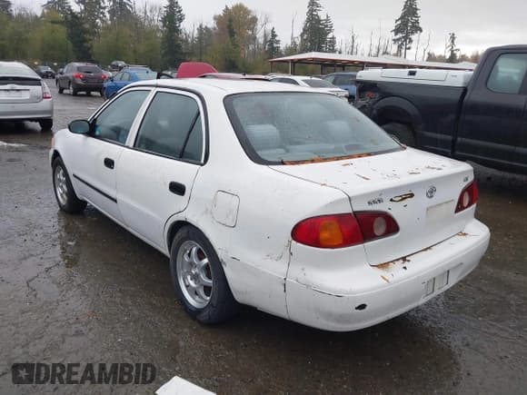 ✅ 2001 Toyota Corolla LE • VIN: 1NXBR12E91Z556651 • Lot: 43611938. Listed on IAAI with 204,814 mi. Free auction sales archive from the USA and detailed vehicle history report at DreamBid. Image 3.
