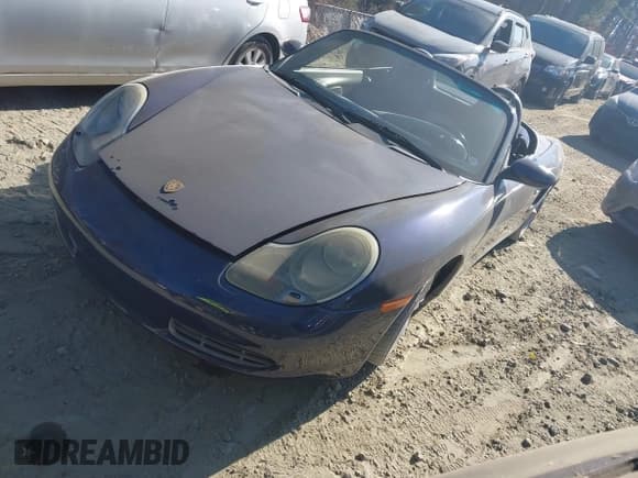 ✅ 2001 Porsche Boxster • VIN: WP0CA29881U624427 • Lot: 43734264. Listed on IAAI with 128,647 mi. Free auction sales archive from the USA and detailed vehicle history report at DreamBid. Image 2.