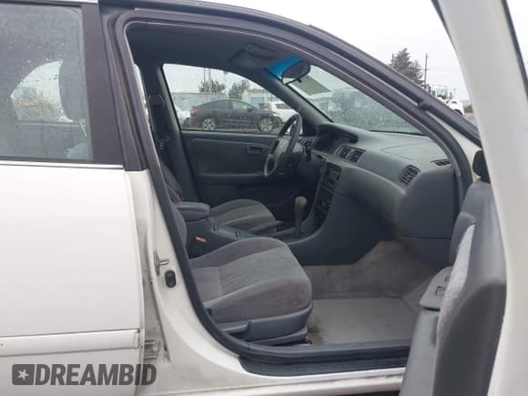 ✅ 2000 Toyota Camry LE • VIN: JT2BF22K3Y0242187 • Lot: 43767695. Listed on IAAI with 295,301 mi. Free auction sales archive from the USA and detailed vehicle history report at DreamBid. Image 5.