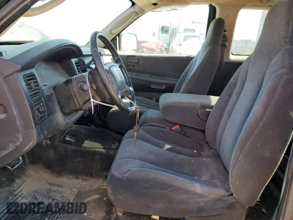 2003 Dodge Dakota SLT z VIN 1D7HL42X33S284170, wystawiony jako Copart lot #76657204 z przebiegiem 146 790 mil mil oraz Szkoda całkowita • Salvage title. Historia ofert i sprzedaży dostępna na DreamBid. Obrazek 7.