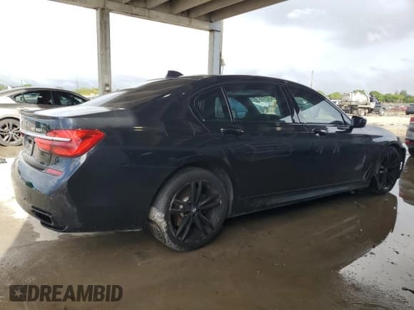 ✅ 2018 BMW 7 Series 750i • VIN: WBA7F0C56JGM22820 • Лот: 84008985. Опубликован ранее на Copart с пробегом 82 715 миль. Бесплатный доступ к архиву аукционных продаж из США и подробный отчёт об истории автомобиля на DreamBid. Изображение 3.