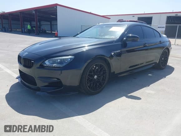 ✅ 2014 BMW M6 • VIN: WBS6C9C52EDV73651 • Lot: 42110470. Listed on IAAI with 127,576 mi. Free auction sales archive from the USA and detailed vehicle history report at DreamBid. Image 17.