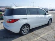 ✅ 2012 Mazda 5 Touring • VIN: JM1CW2CL2C0125776 • Lot: 42496258. Wystawiony na IAAI z przebiegiem 130 522 mil. Bezpłatny archiwum sprzedaży aukcyjnych z USA i szczegółowy raport historii pojazdu na DreamBid. Zdjęcie 4.