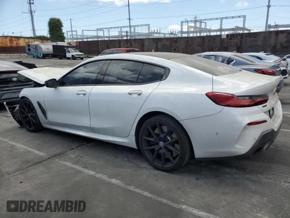 ✅ 2021 BMW 8 Series M850i • VIN: WBAGV8C04MCF56486 • Lot: 55991015. Listed on Copart with 60,249 mi. Free auction sales archive from the USA and detailed vehicle history report at DreamBid. Image 2.