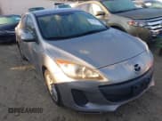 ✅ 2012 Mazda 3 i Touring • VIN: JM1BL1V7XC1550980 • Lot: 43473671. Listed on IAAI with 96,476 mi. Free auction sales archive from the USA and detailed vehicle history report at DreamBid. Image 1.
