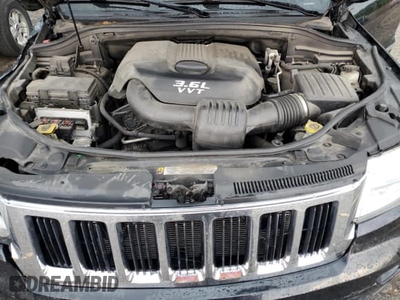 ✅ 2012 Jeep Grand Cherokee Limited • VIN: 1C4RJFBG7CC140440 • Lot: 66515575. Wystawiony na Copart z przebiegiem 193 685 mil. Bezpłatny archiwum sprzedaży aukcyjnych z USA i szczegółowy raport historii pojazdu na DreamBid. Zdjęcie 12.