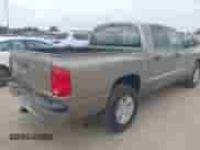 2006 Dodge Dakota SLT with VIN 1D7HE48N16S703072, listed as a IAAI auction lot 42156709 with 102,919 mi miles and . Bid and sale history available at DreamBid. Image 4.