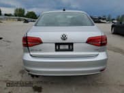 ✅ 2015 Volkswagen Jetta SE • VIN: 3VWD17AJ1FM311745 • Lot: 55936435. Listed on Copart with 79,819 mi. Free auction sales archive from the USA and detailed vehicle history report at DreamBid. Image 6.