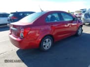 ✅ 2014 Chevrolet Sonic LT • VIN: 1G1JC5SH6E4143068 • Lot: 43754575. Listed on IAAI with 139,861 mi. Free auction sales archive from the USA and detailed vehicle history report at DreamBid. Image 4.