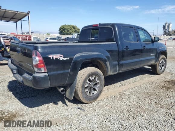 ✅ 2011 Toyota Tacoma PreRunner • VIN: 3TMKU4HNXBM030174 • Lot: 64105395. Listed on Copart with 173,022 mi. Free auction sales archive from the USA and detailed vehicle history report at DreamBid. Image 3.