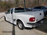 ✅ 1997 Ford F-150 • VIN: 1FTDX0766VKA86983 • Lot: 50896215. Listed on Copart with 214,746 mi. Free auction sales archive from the USA and detailed vehicle history report at DreamBid. Image 2.
