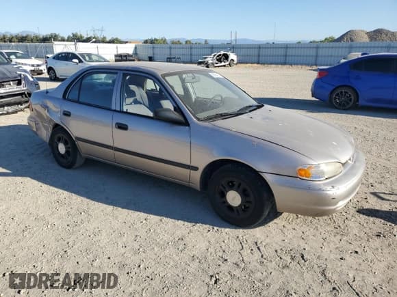 ✅ 2000 Chevrolet Prizm • VIN: 1Y1SK5485YZ407556 • Lot: 60894355. Listed on Copart with 123,708 mi. Free auction sales archive from the USA and detailed vehicle history report at DreamBid. Image 4.