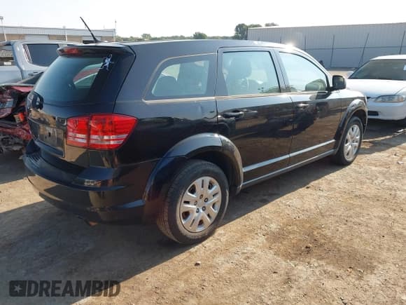 ✅ 2014 Dodge Journey American Value • VIN: 3C4PDCAB6ET281610 • Lot: 43211300. Listed on IAAI with 128,713 mi. Free auction sales archive from the USA and detailed vehicle history report at DreamBid. Image 4.