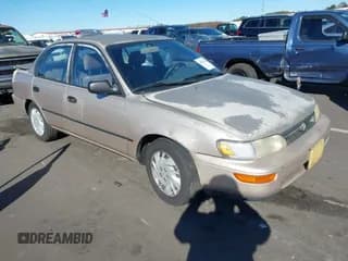 ✅ 1995 Toyota Corolla DX • VIN: 2T1AE09B0SC119881 • Lot: 43627422. Listed on IAAI with 244,981 mi. Free auction sales archive from the USA and detailed vehicle history report at DreamBid. Image 1.