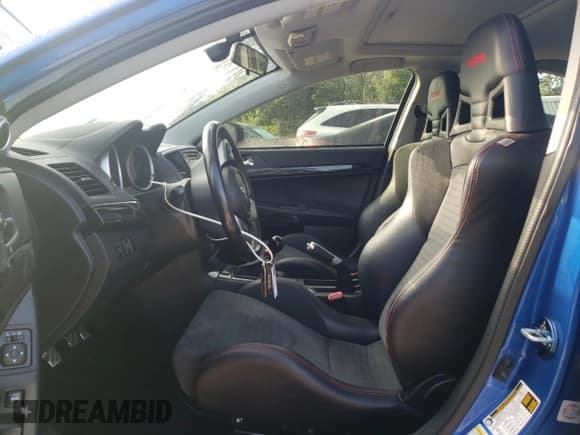 ✅ 2015 Mitsubishi Lancer Evolution Final Edition • VIN: JA32W7FV7FU608214 • Lot: 68316174. Wystawiony na Copart z przebiegiem 56 714 mil. Bezpłatny archiwum sprzedaży aukcyjnych z USA i szczegółowy raport historii pojazdu na DreamBid. Zdjęcie 7.