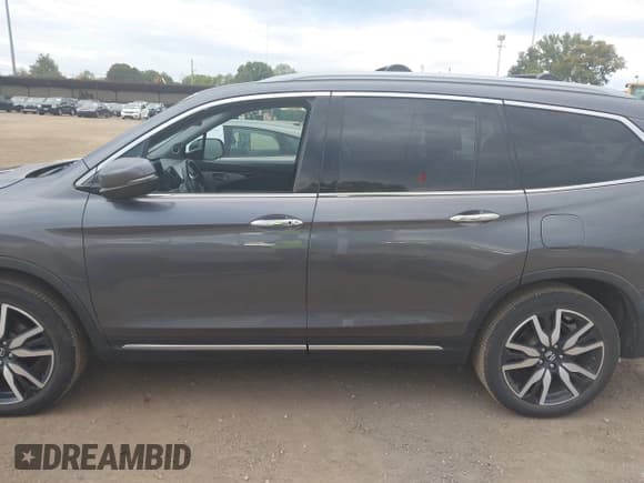 ✅ 2022 Honda Pilot Touring 7-Passenger • VIN: 5FNYF5H64NB000552 • Лот: 43450219. Опубликован ранее на IAAI с пробегом 84 697 миль. Бесплатный доступ к архиву аукционных продаж из США и подробный отчёт об истории автомобиля на DreamBid. Изображение 15.