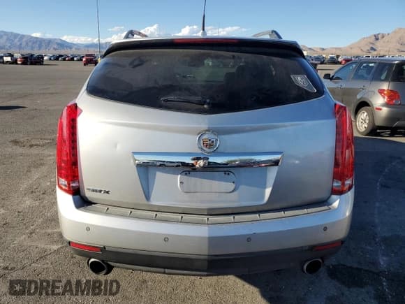 ✅ 2011 Cadillac SRX Premium Collection • VIN: 3GYFNCEY6BS556458 • Lot: 82717745. Wystawiony na Copart z przebiegiem Nie podano. Bezpłatny archiwum sprzedaży aukcyjnych z USA i szczegółowy raport historii pojazdu na DreamBid. Zdjęcie 6.