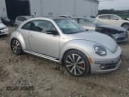 ✅ 2012 Volkswagen Beetle Turbo • VIN: 3VWVA7ATXCM663188 • Lot: 81608535. Wystawiony na Copart z przebiegiem 64 082 mil. Bezpłatny archiwum sprzedaży aukcyjnych z USA i szczegółowy raport historii pojazdu na DreamBid. Zdjęcie 4.