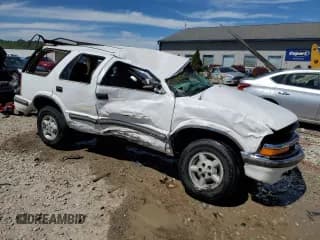 ✅ 1999 Chevrolet Blazer Trailblazer • VIN: 1GNDT13W1X2242994 • Lot: 61009094. Wystawiony na Copart z przebiegiem Nie podano. Bezpłatny archiwum sprzedaży aukcyjnych z USA i szczegółowy raport historii pojazdu na DreamBid. Zdjęcie 4.