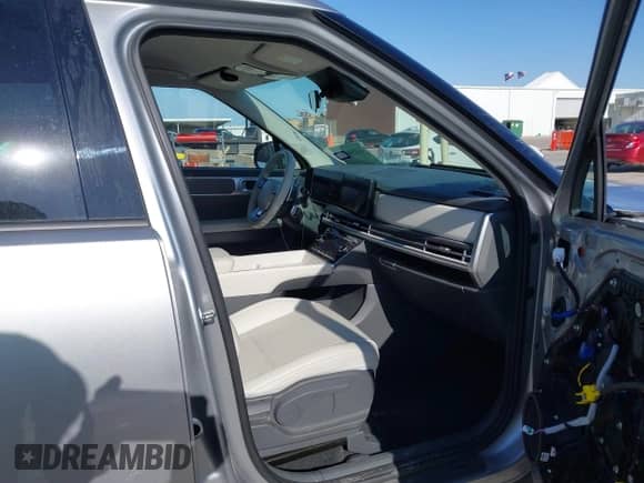 2024 Hyundai Santa Fe SEL z VIN 5NMP24GL4RH022497, wystawiony jako IAAI lot #41034640 z przebiegiem 21 298 mil mil oraz . Historia ofert i sprzedaży dostępna na DreamBid. Obrazek 5.